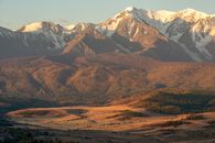 Brown and White Mountains Under Blue Sky