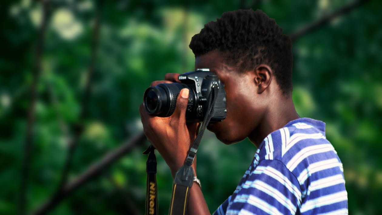 Gratis lagerfoto af afrikansk dreng, film, kamera