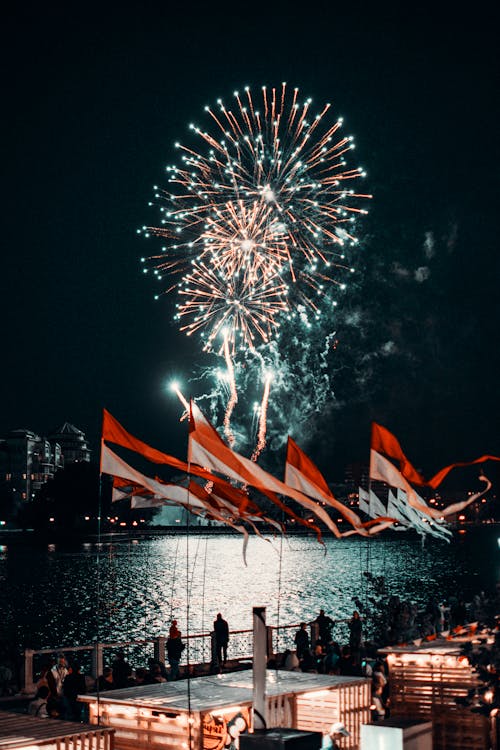 People Watching Fireworks During Night