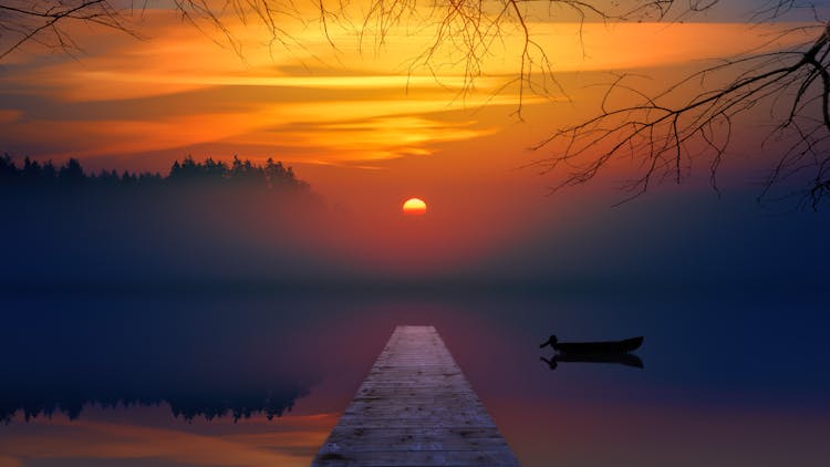 Brown Dock During Sunset