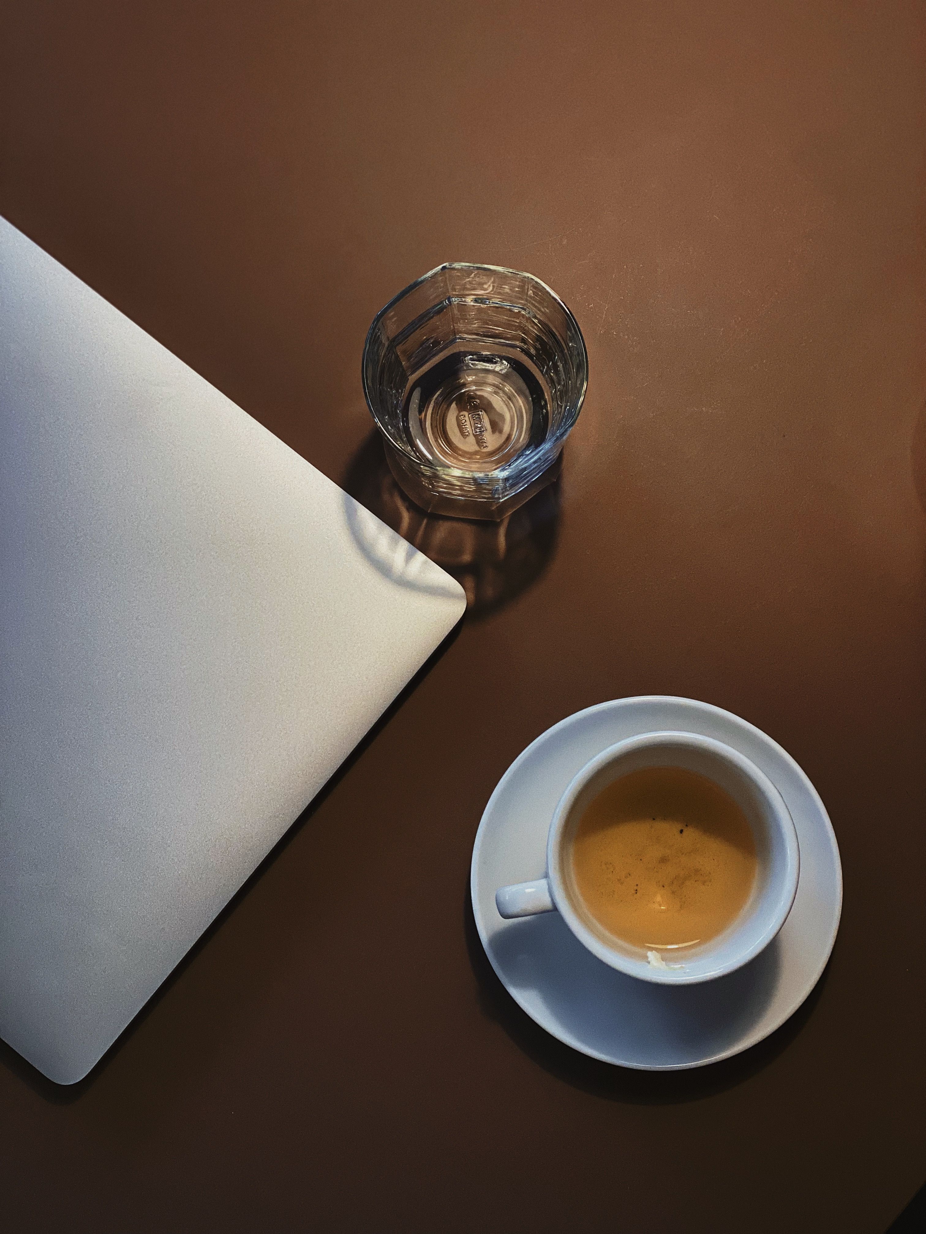Cup of tea on a desk in warm light