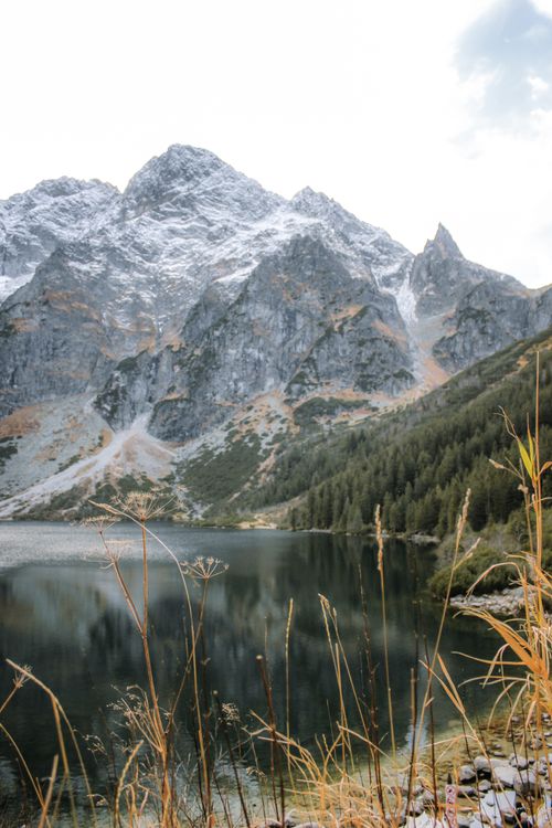 Free Beautiful mountainous landscape by a serene lake in Zakopane, Poland. Perfect for nature enthusiasts. Stock Photo