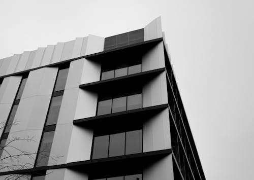 Grayscale Photo of Concrete Building
