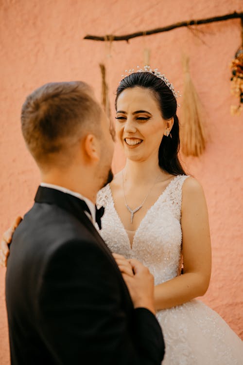 Bride and Bridegroom Holding Hands 