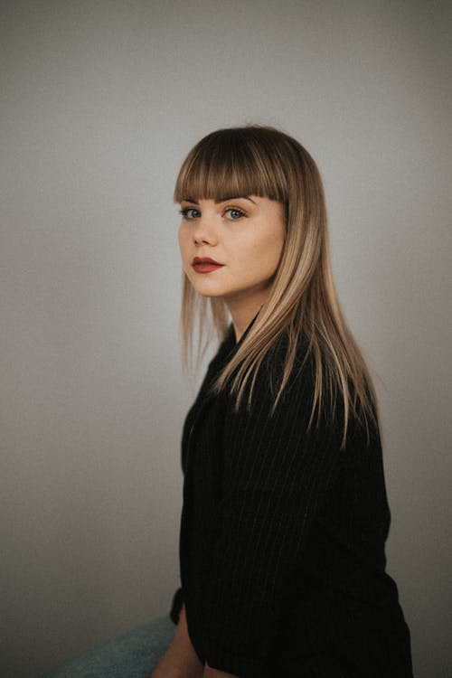 A Woman in Black Long Sleeve Shirt