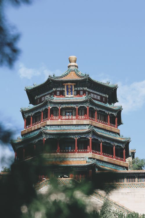Free Impressive traditional Chinese pagoda with intricate design and heritage significance against a blue sky. Stock Photo