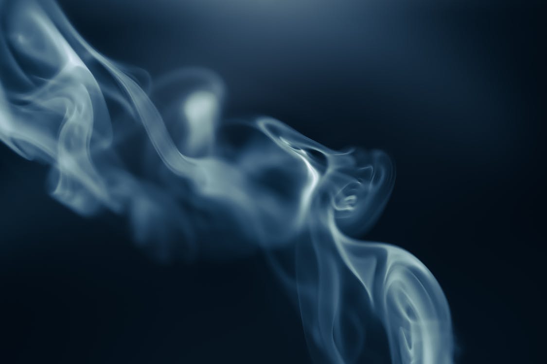 Free White Smoke in Black Background Stock Photo