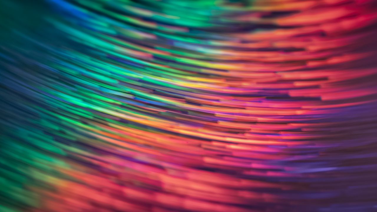 dynamic display of swirling rainbow light streaks with a futuristic an