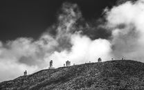 Grayscale Photo of Castle on Hill