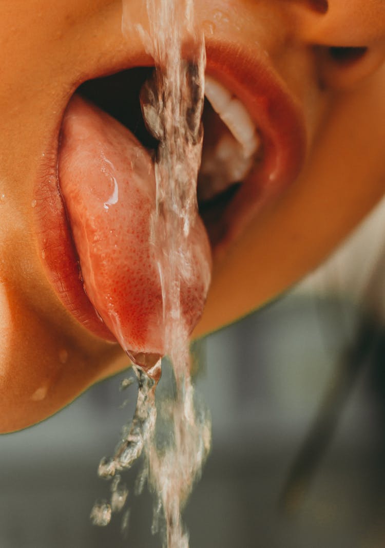 Woman Drinking Flowing Water 