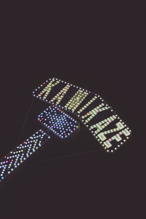Free Bright neon lights forming a colorful, abstract pattern at night in Curitiba, Brazil. Stock Photo