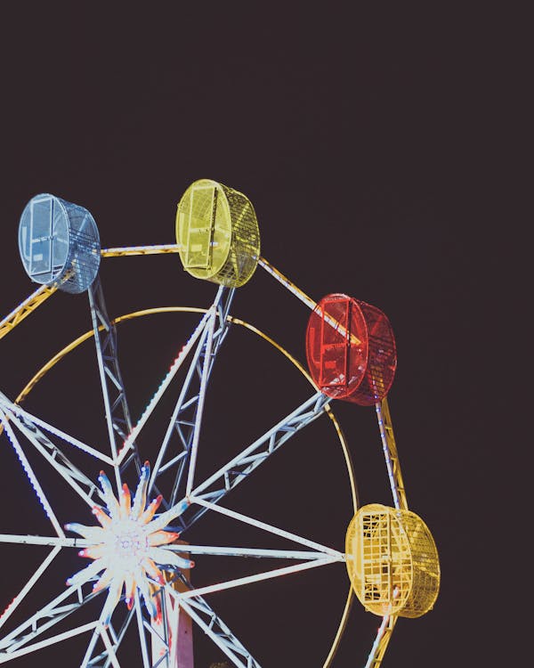 A Colorful Ferris Wheel in the Dark