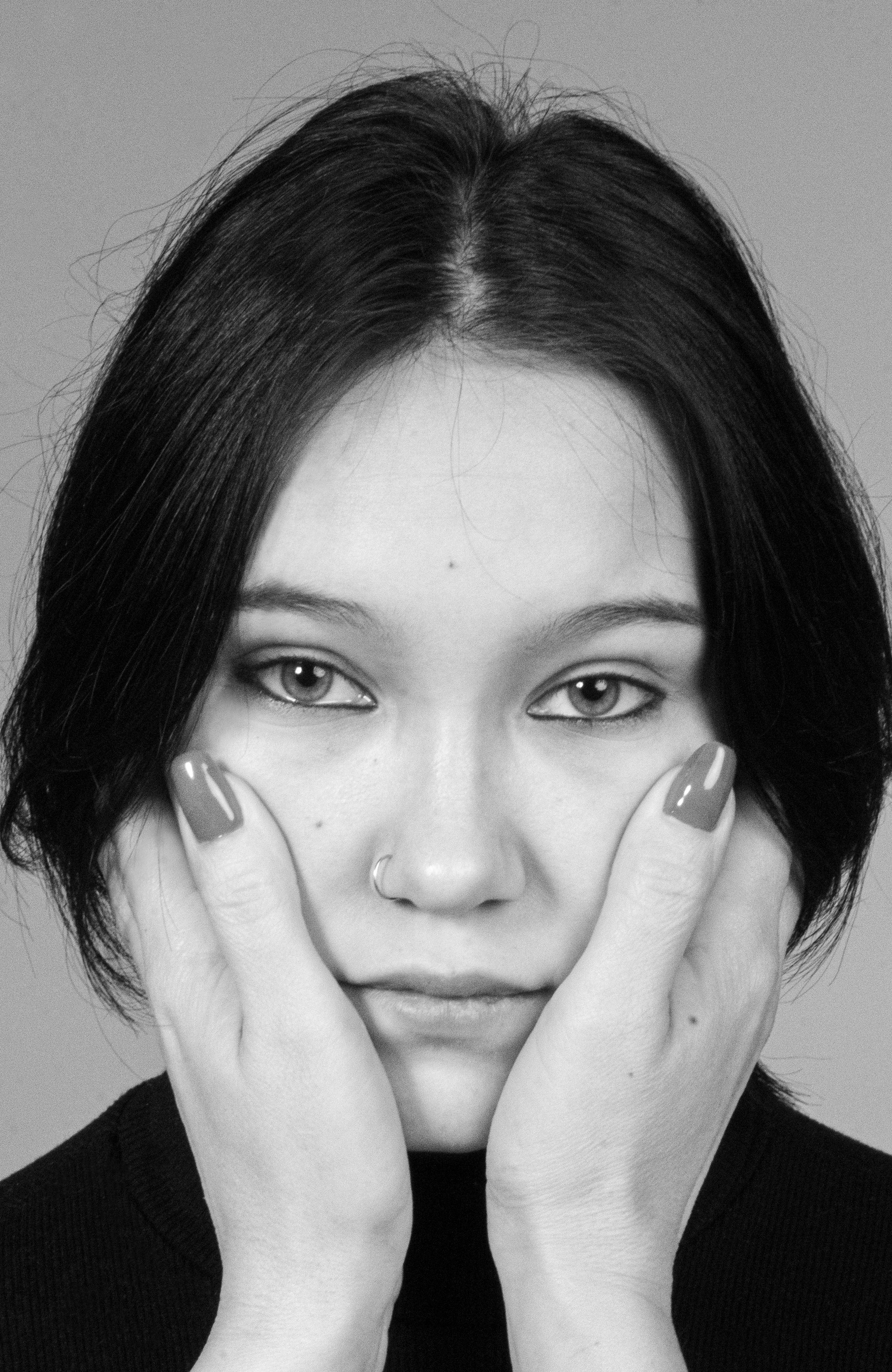 A Woman With Sad Face in Close-Up Photography · Free Stock Photo