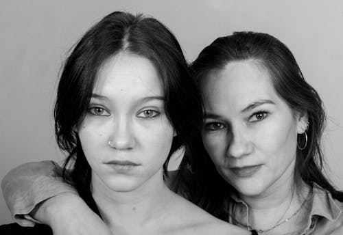 Free A Grayscale Photo of Women with a Serious Face Stock Photo