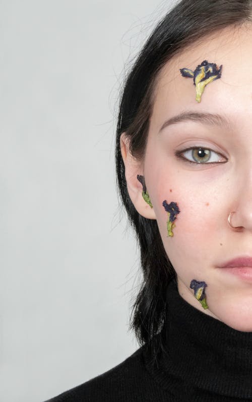 Free Woman With Yellow and Green Butterfly on Her Face Stock Photo