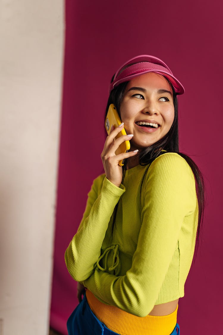 Woman Talking On Phone And Smiling