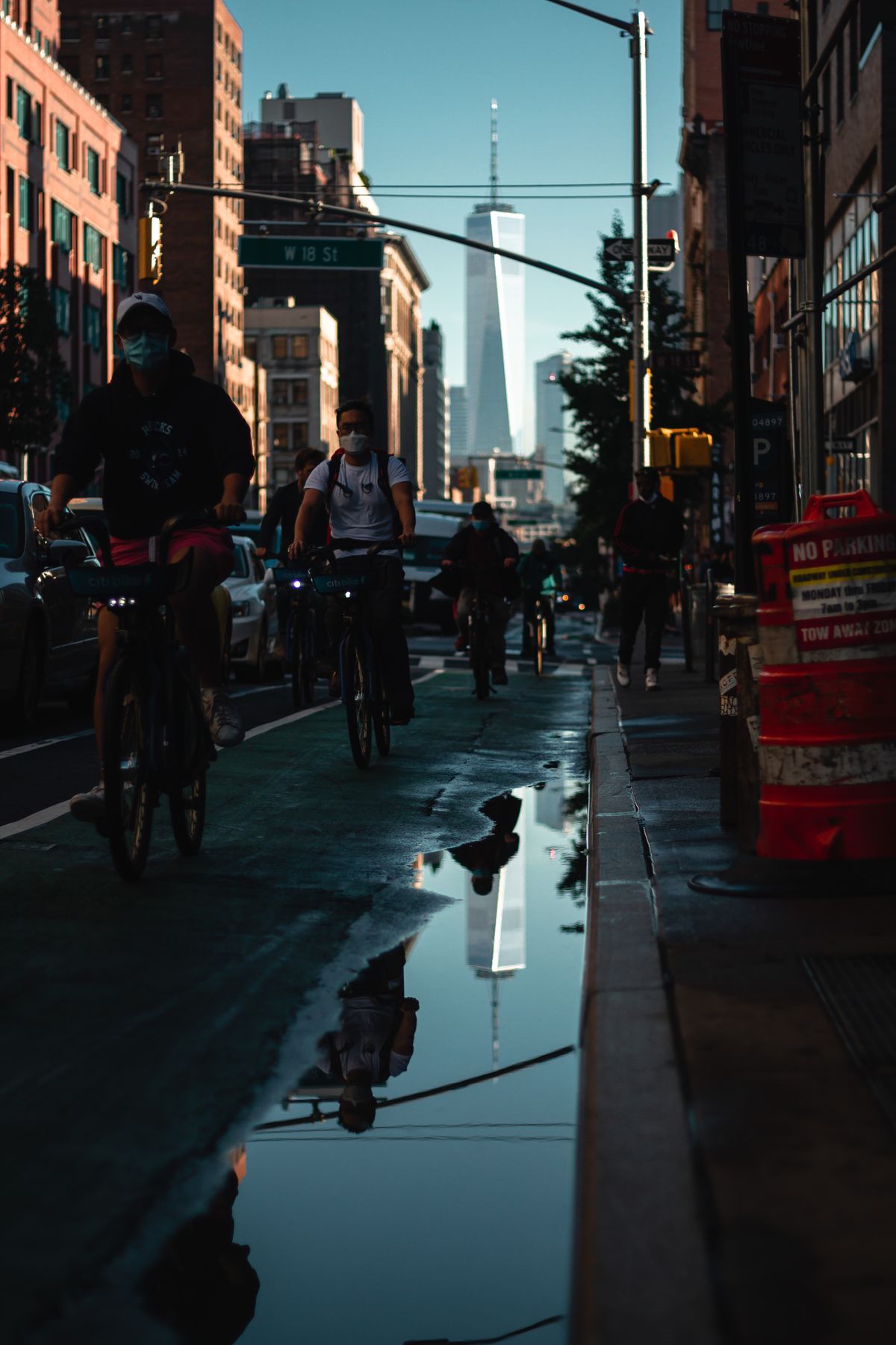 Cyclists traveling together along a modern urban street