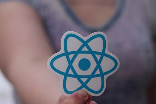 Hand Holding React Sticker