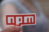 Person Holding a Red NPM Sticker