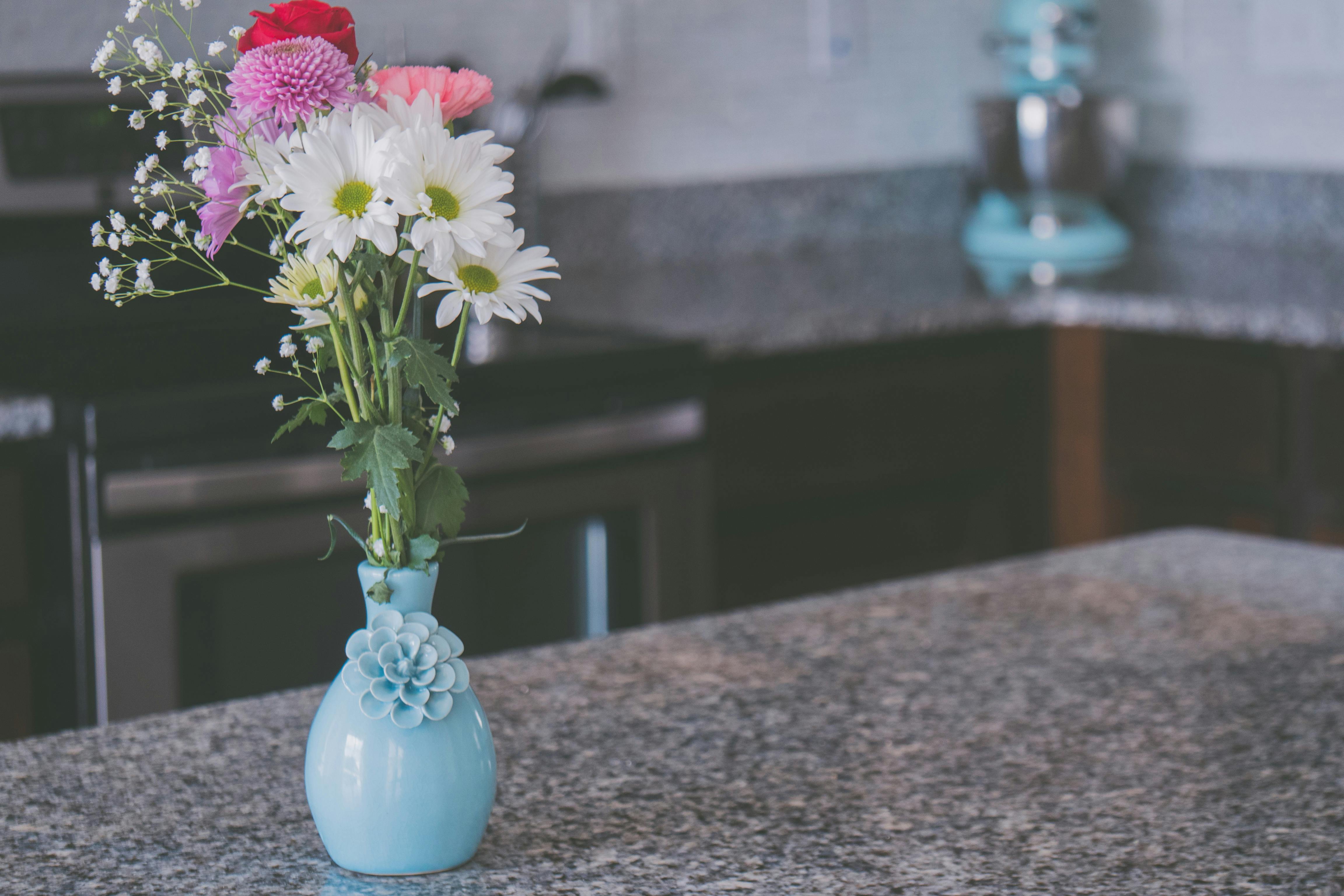 White Petaled Flowers With Teal Ceramic Vase · Free Stock Photo