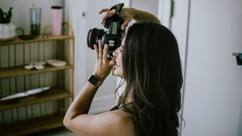 Taking Pictures of a Model · Free Stock Photo