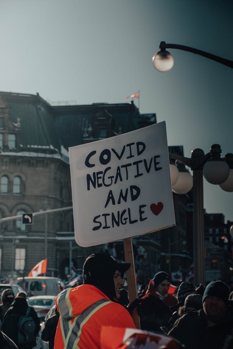 Banner Of People Protesting In City