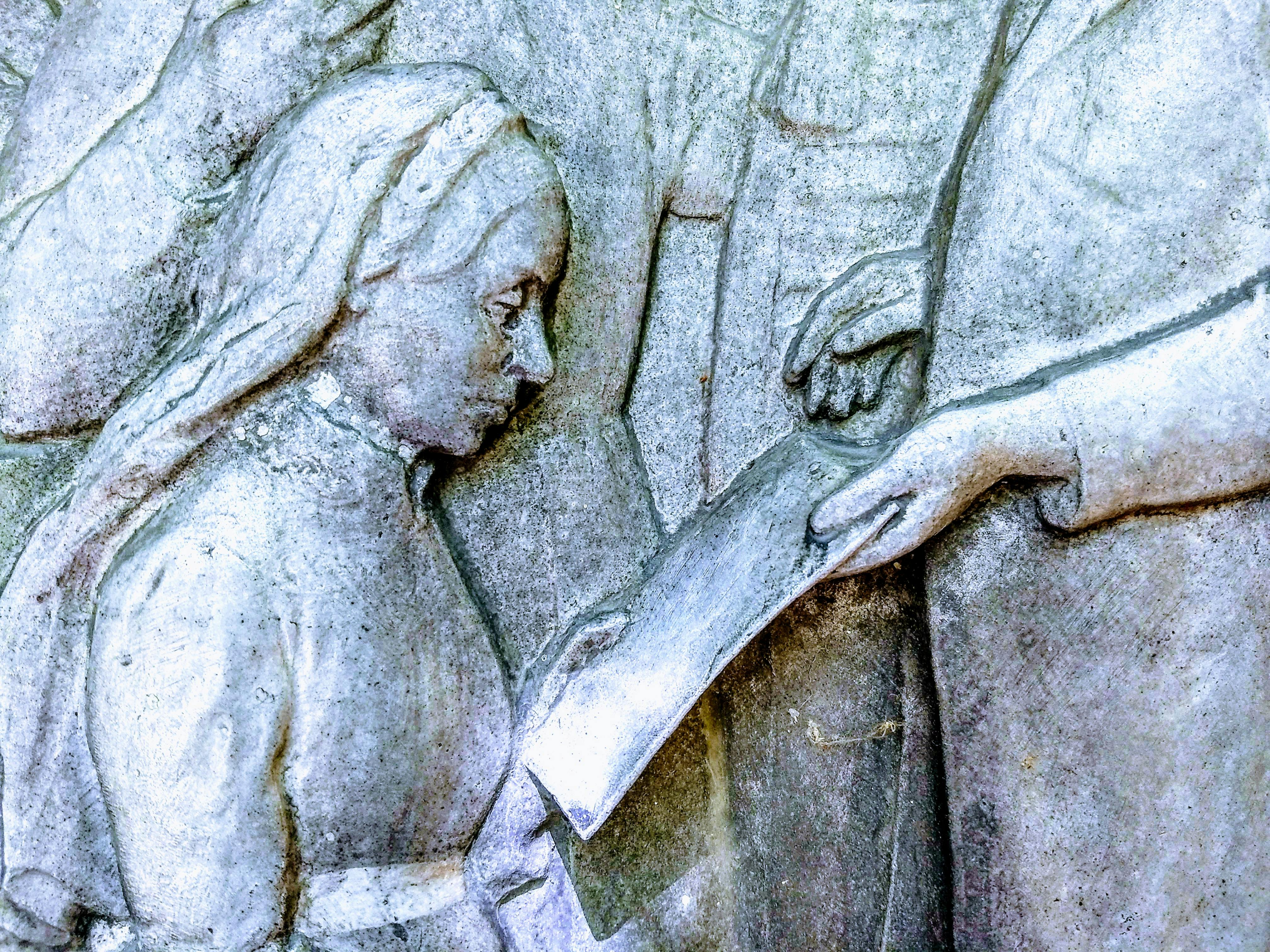 Basketball player dunking with crowd watching in an arena