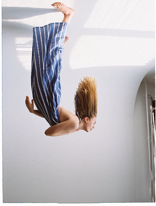 Woman Standing Upside Down