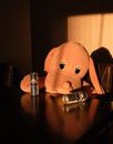 Brown Animal Plush Toy on Brown Wooden Table