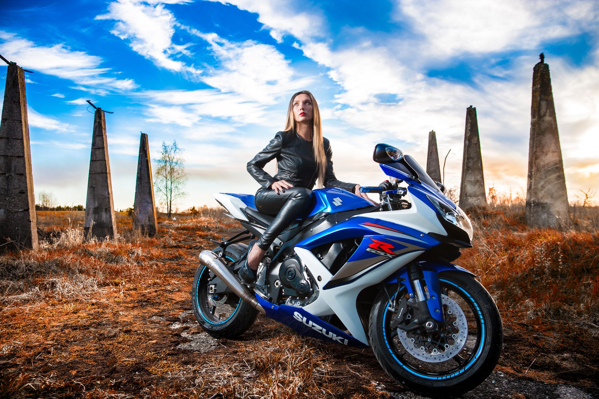 Woman In Black Leather Jacket Sitting On Blue And White Suzuki Gsx-r