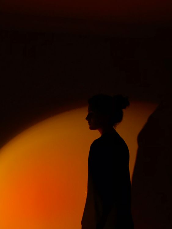 Shadow of a Woman on the Wall · Free Stock Photo