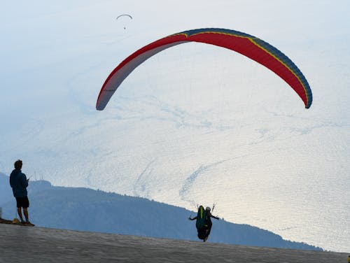 Person Doing a Paragliding