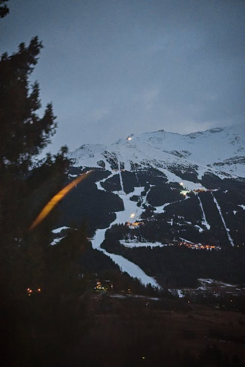 Clouds over Mountain and Lake in Winter 