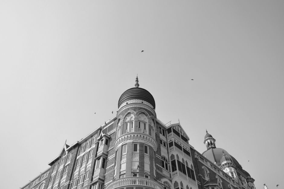 Black and white image of the historic Taj Mahal Palace Hotel, Mumbai.