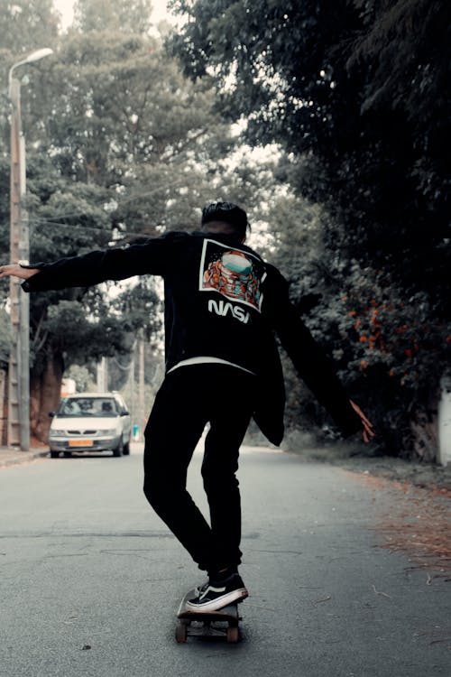 Foto stok gratis jaket hitam, olahraga ekstrem, pemain skateboard