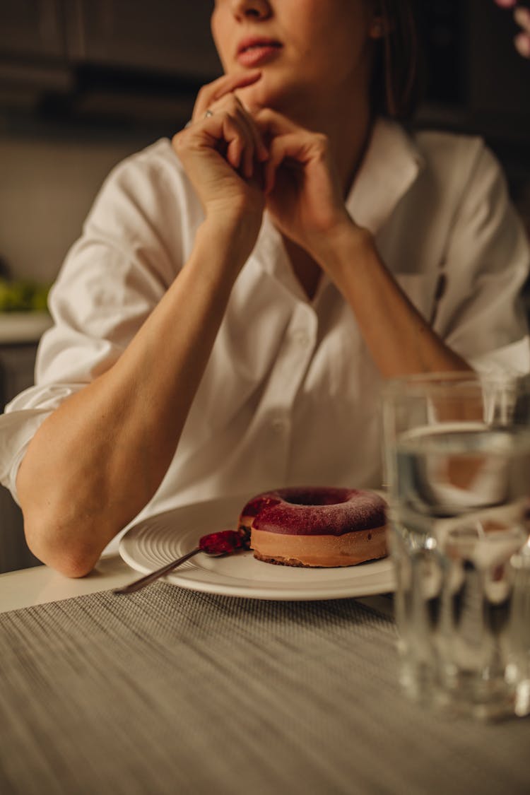 Woman Eating A Cake 