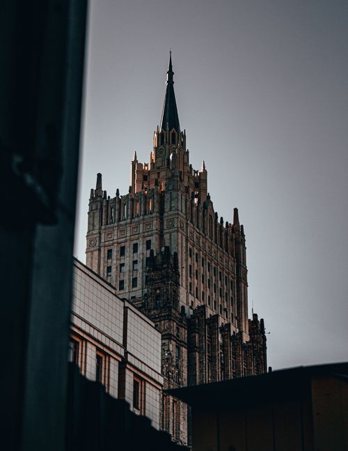 Free Stunning view of a Gothic-style skyscraper in Moscow captured at dawn, showcasing intricate architectural details. Stock Photo
