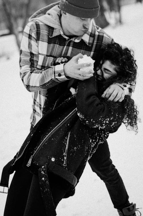 A Couple Playing Snow