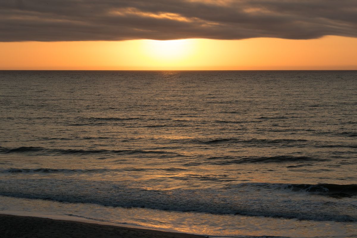 Calm peaceful coastal ocean grandparents sunset