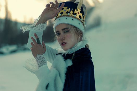 Portrait of Beautiful Woman Wearing a Crown