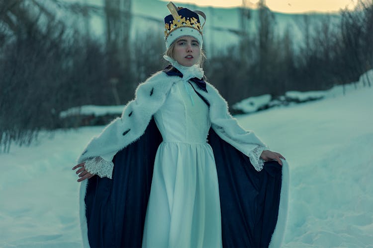 Shallow Focus Photo Of Woman Wearing A Queen Costume