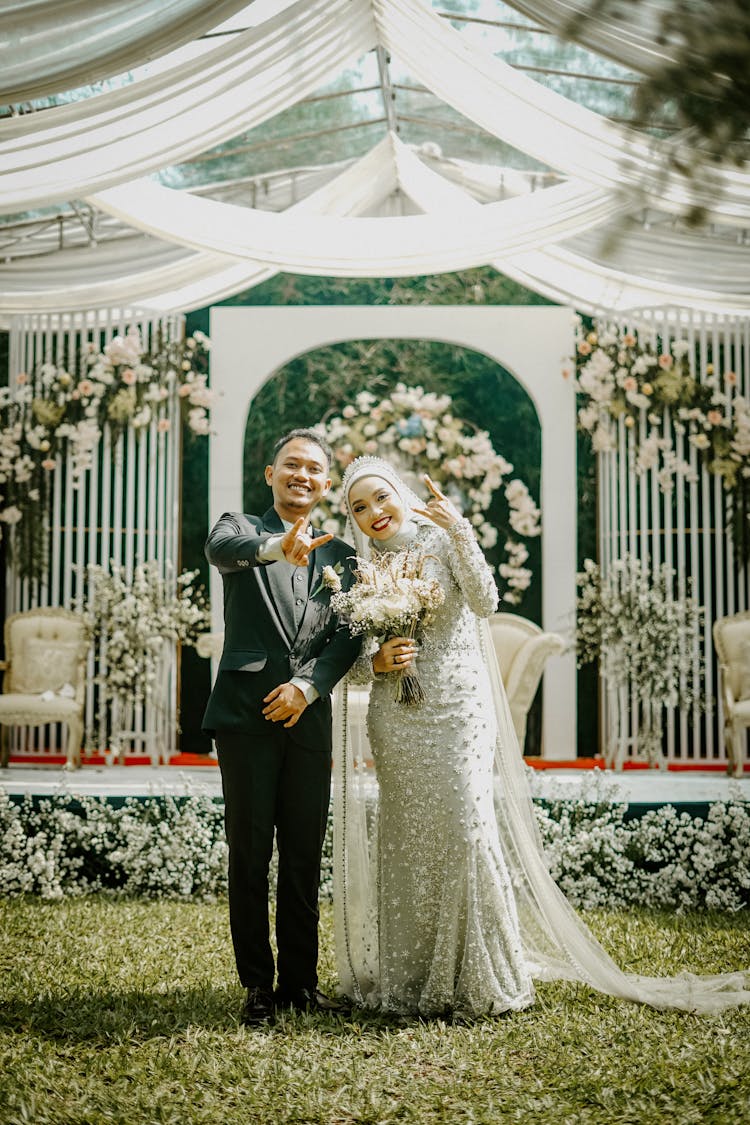 Groom And Bride In Garden Wedding Scene