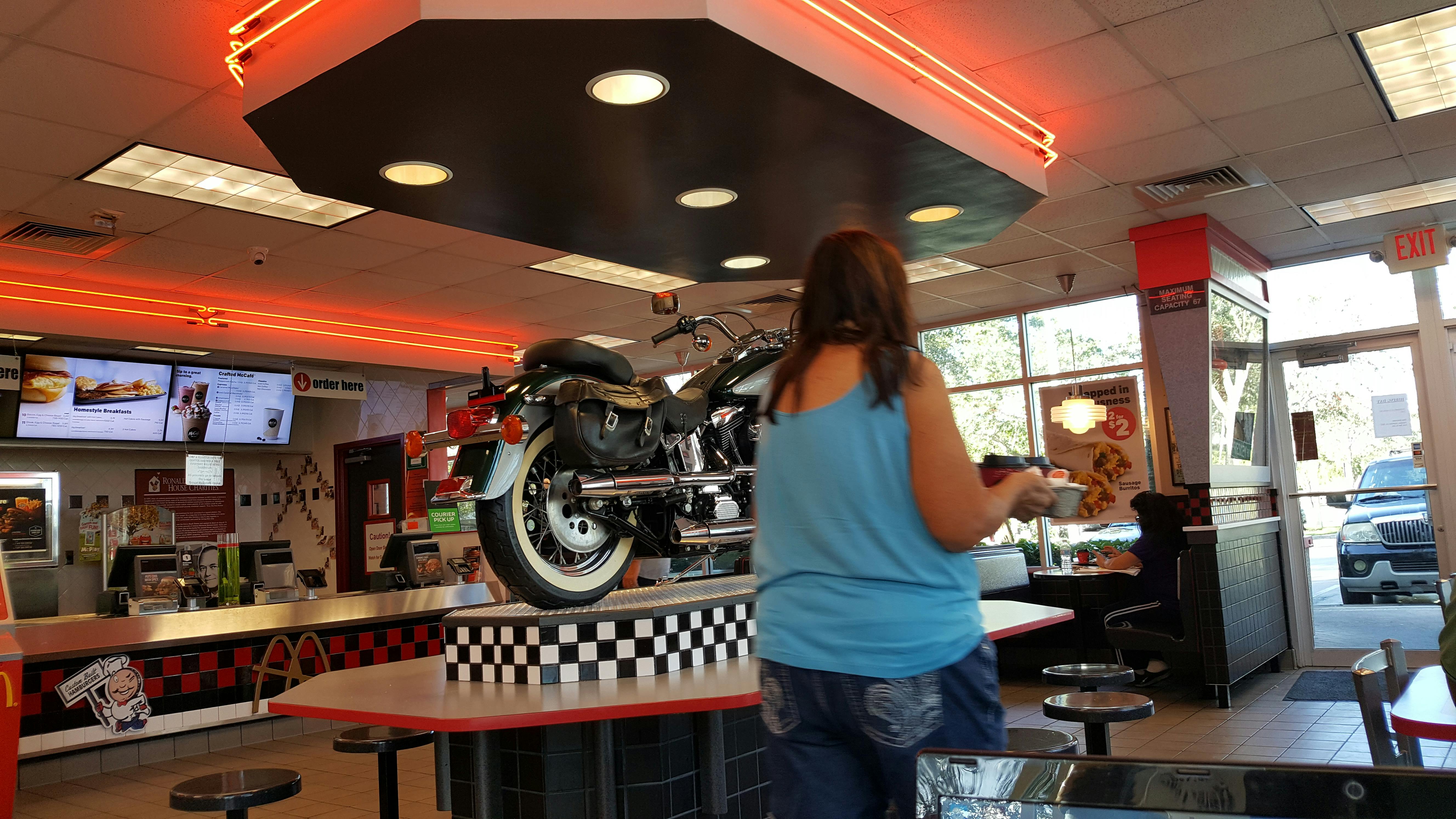 Person Running Along a Boardwalk