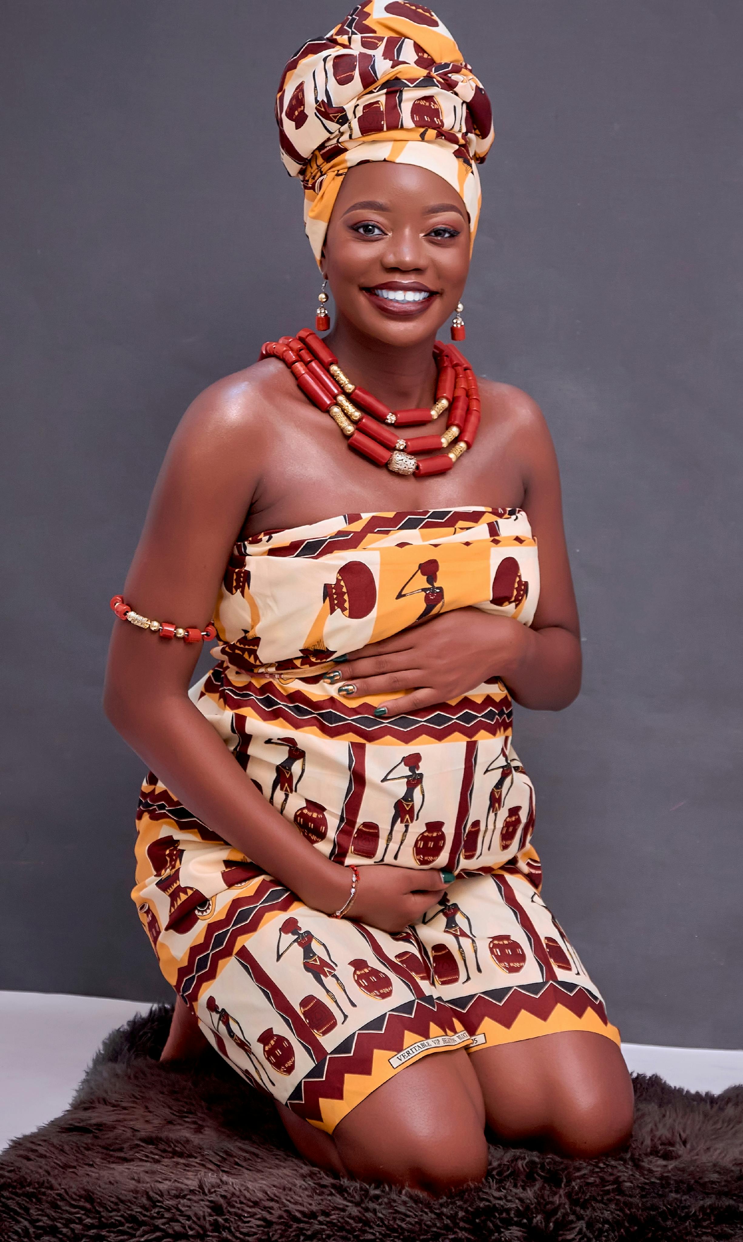 Woman in Traditional African Clothes and Turban · Free Stock Photo