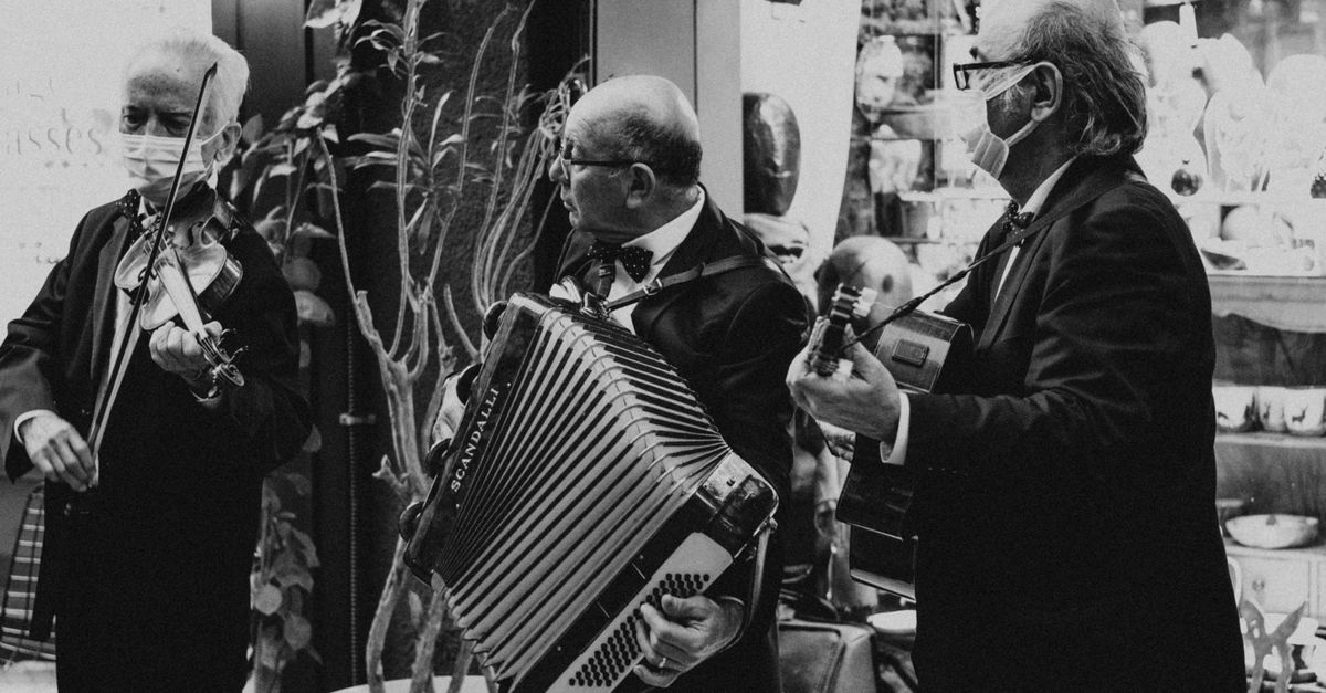 Men Playing Musical Instruments on the Street · Free Stock Photo
