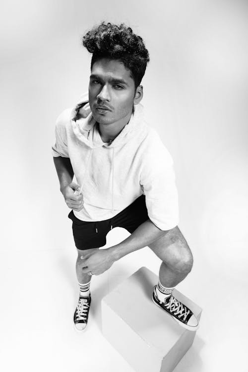 Studio Portrait of Man in Shorts