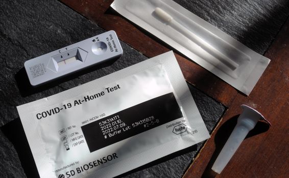 A close-up of a rapid antigen test kit being analyzed to determine rapid antigen test accuracy.
