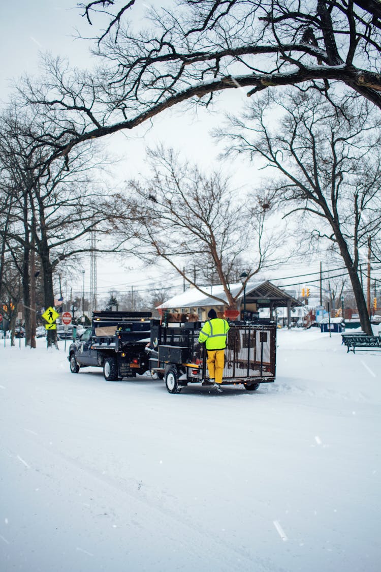 People And Car On Winter City Street