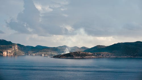 Scenic View of a Bay Under Cloudy Sky