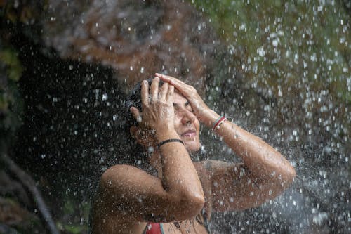 Water Splashing on Woman